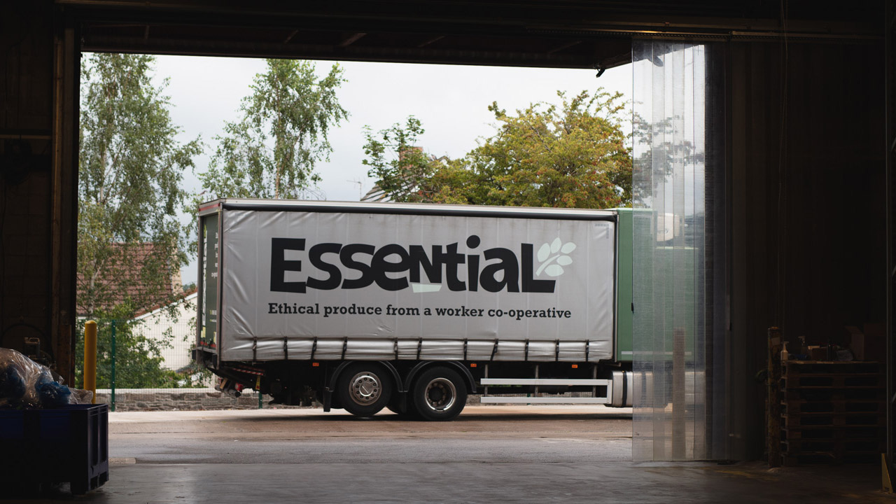 An Essential lorry leaving the warehouse