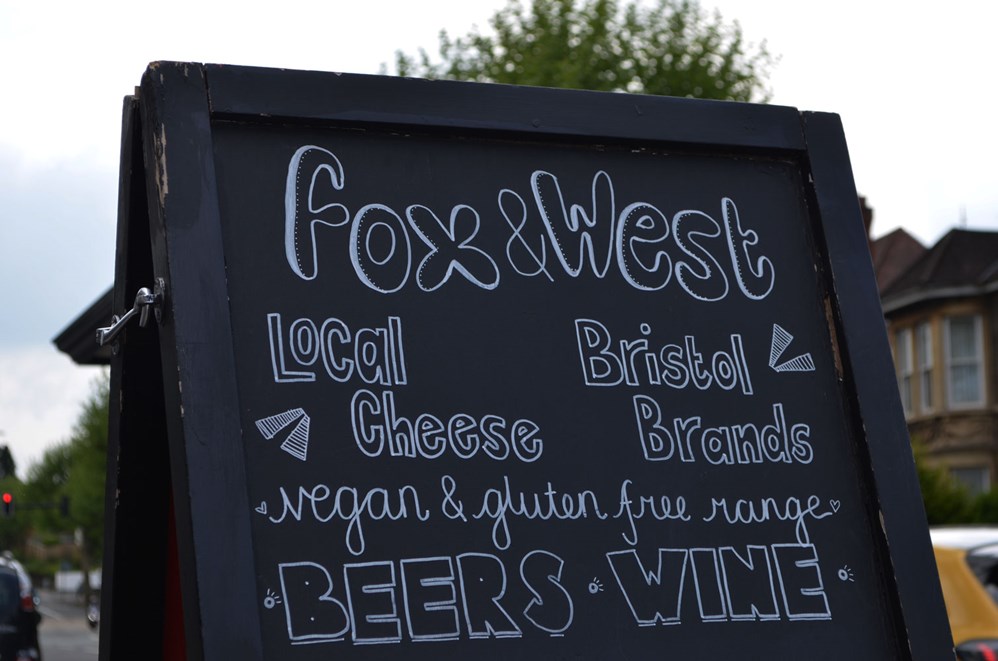 fox & west a board sign outside shop