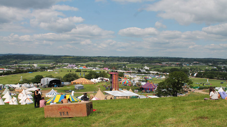 A view of a festival from on top of a hill